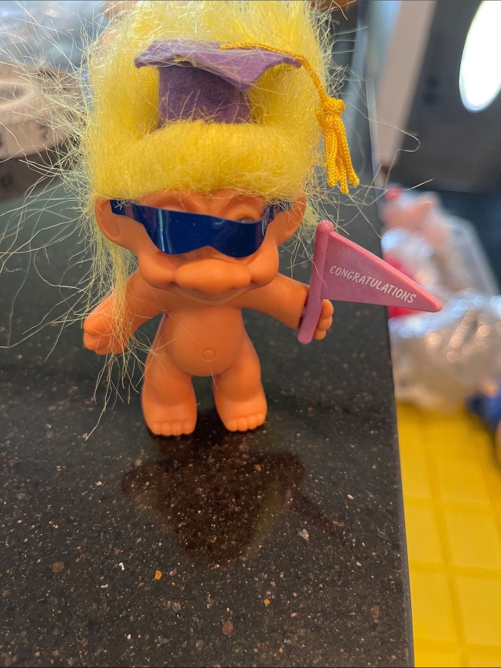 Russ Yellow-Haired Graduation Troll with Pink Congrats Flag and Blue Sunglasses